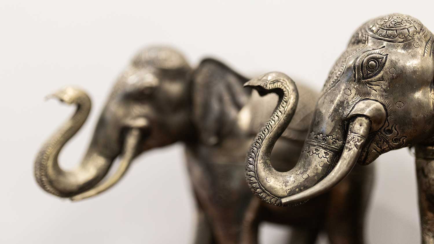 Ornate silver elephant sculptures